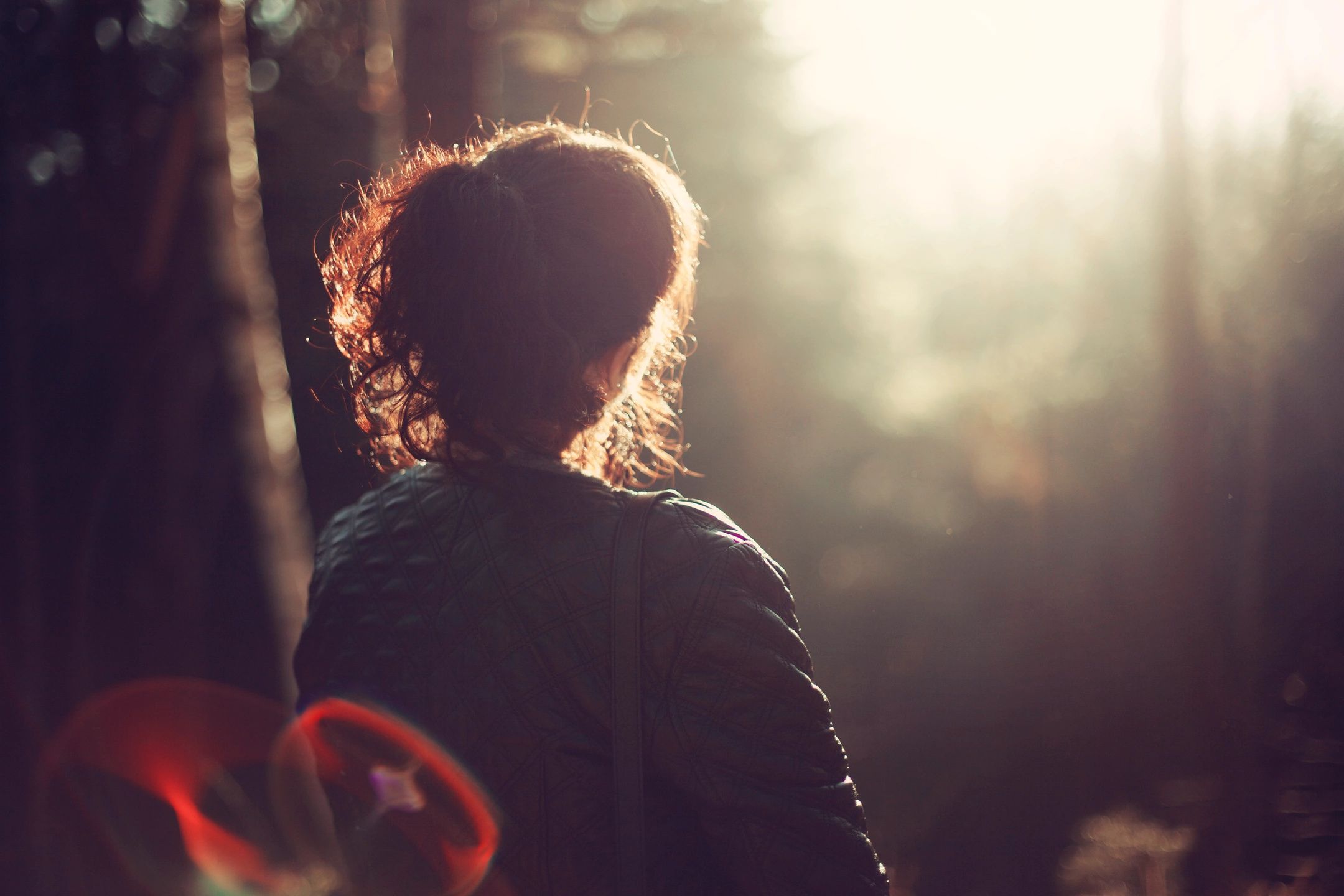 woman sitting in chair in the sun